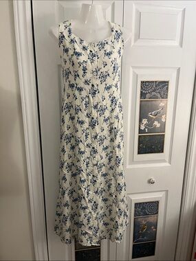 Sleeveless Cream Midi Dress with Blue Floral Print